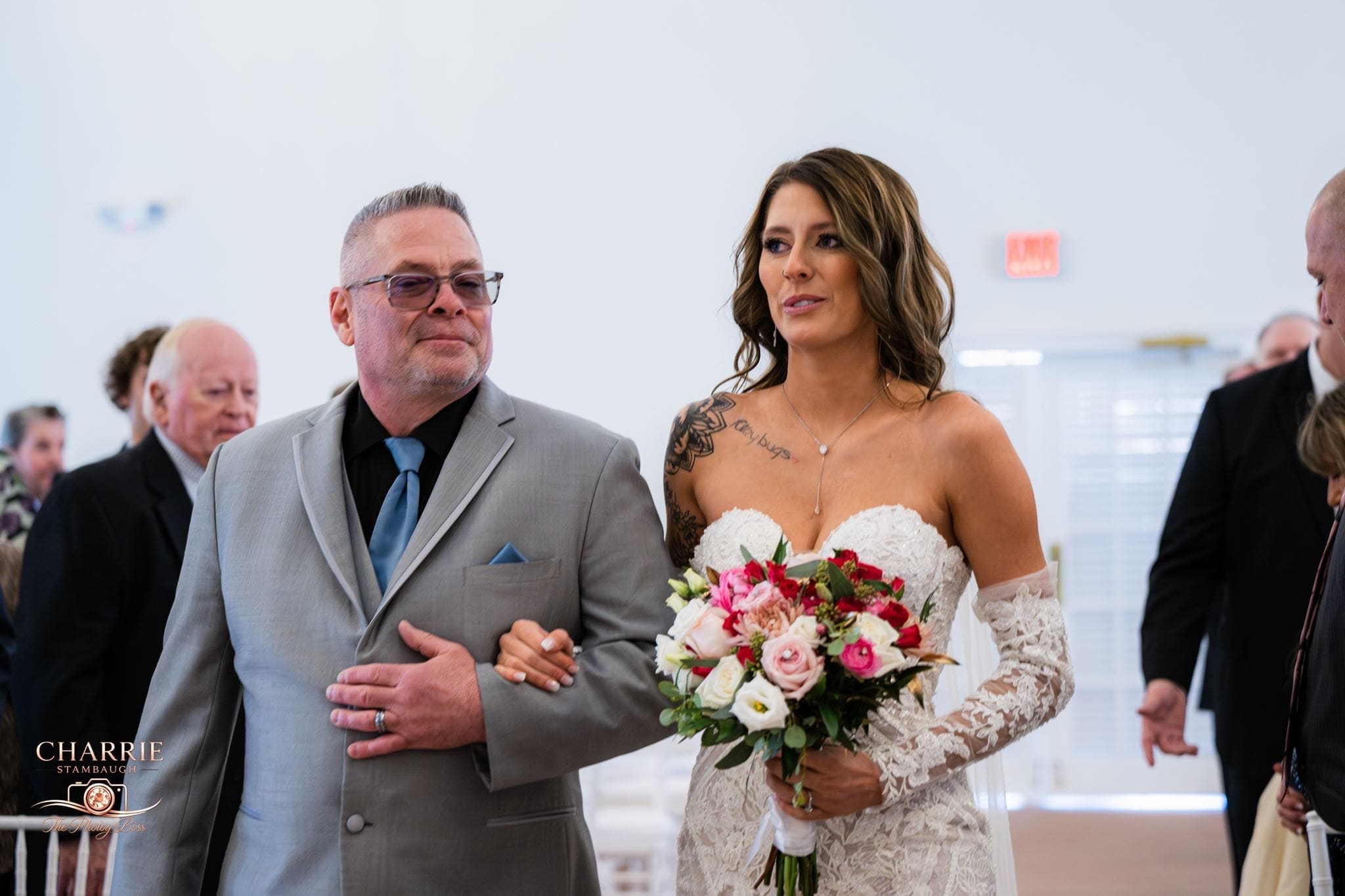 A father walking his daughter down the aisle at the Ritz Charles